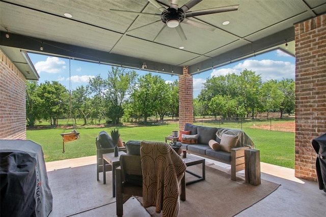 3154 Red Ridge Dr, Blanchard, OK 73010 - view of patio / terrace featuring ceiling fan, an outdoor living space, area for grilling, and view of wooded area