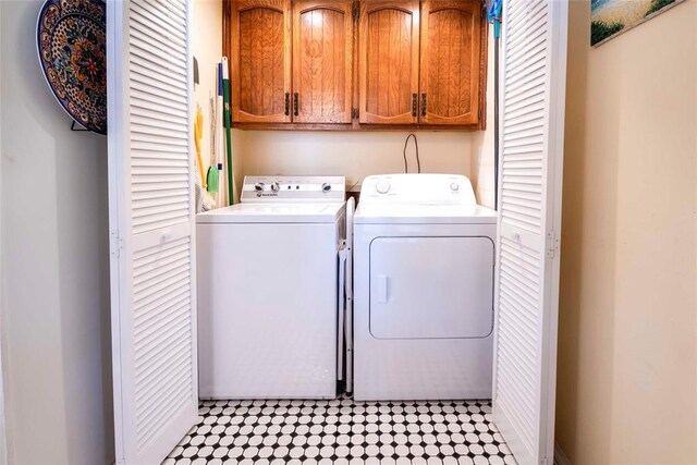 201 W 8th St, Chandler, OK 74834 - laundry area with washing machine and clothes dryer and cabinet space