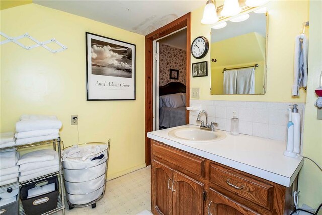 201 W 8th St, Chandler, OK 74834 - bathroom with tile patterned floors and vanity