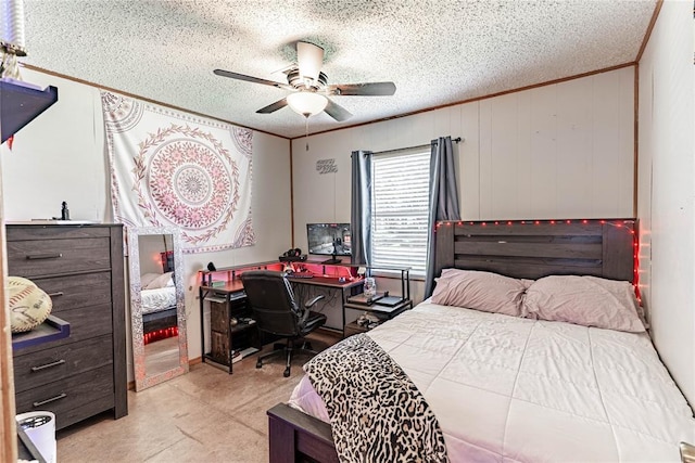 1343 E Moses St, Cushing, OK 74023 - bedroom featuring ornamental molding, a textured ceiling, a ceiling fan, and an office area