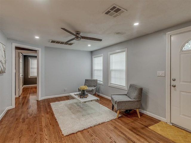 2417 SW 47th St, Oklahoma City, OK 73129 - sitting room with wood finished floors, ceiling fan, baseboards, and recessed lighting