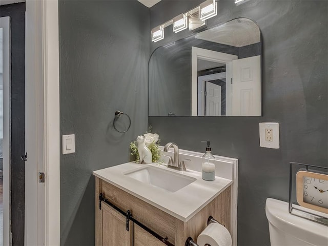 2417 SW 47th St, Oklahoma City, OK 73129 - half bathroom featuring vanity and toilet