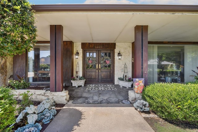 2917 W Pelham Dr, Oklahoma City, OK 73120 - doorway to property featuring covered porch