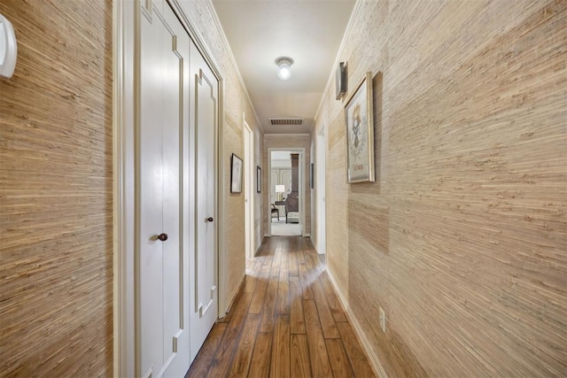 2917 W Pelham Dr, Oklahoma City, OK 73120 - hallway with ornamental molding and dark wood finished floors