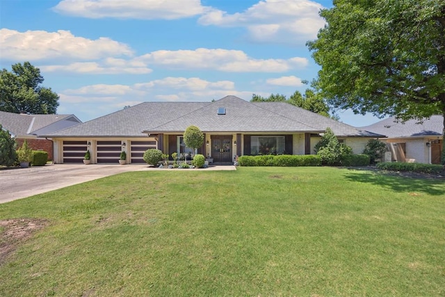 2917 W Pelham Dr, Oklahoma City, OK 73120 - ranch-style home featuring a garage, concrete driveway, and a front lawn