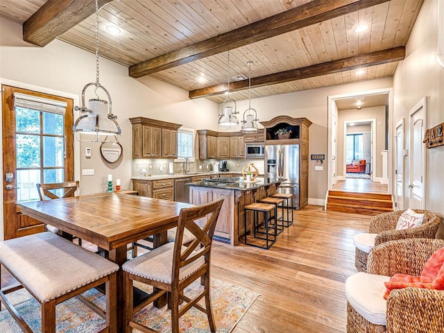 37271 S Cliff Crest Dr, Langley, OK 74301 - dining room with wooden ceiling with exposed beams, light wood finished floors, and baseboards