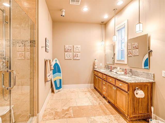37271 S Cliff Crest Dr, Langley, OK 74301 - full bathroom with double vanity, a shower stall, baseboards, and recessed lighting