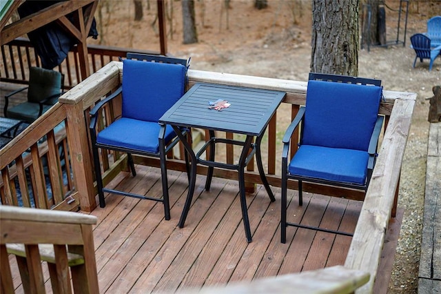 1073 Southern Hills Cir, Broken Bow, OK 74728 - wooden terrace with outdoor dining area