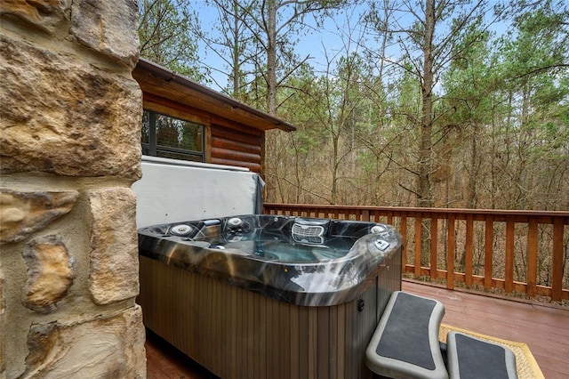 1073 Southern Hills Cir, Broken Bow, OK 74728 - wooden deck with a hot tub and a forest view