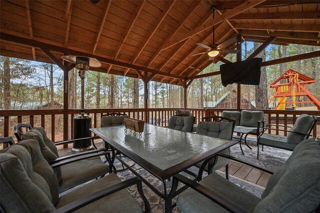 1073 Southern Hills Cir, Broken Bow, OK 74728 - sunroom / solarium featuring ceiling fan, outdoor dining space, and an outdoor living space