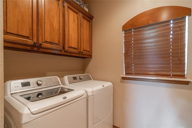 108 Raye Pl, Tuttle, OK 73089 - laundry room featuring washer and dryer and cabinet space