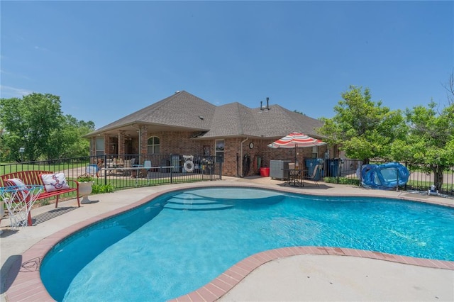 108 Raye Pl, Tuttle, OK 73089 - view of pool with a patio area and central air condition unit