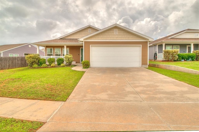15108 Coldsun Dr, Oklahoma City, OK 73170 - view of front facade with a garage, a porch, and driveway