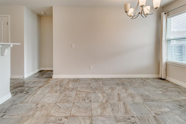 15108 Coldsun Dr, Oklahoma City, OK 73170 - empty room with baseboards and a chandelier