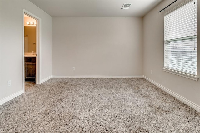 15108 Coldsun Dr, Oklahoma City, OK 73170 - carpeted empty room with healthy amount of natural light