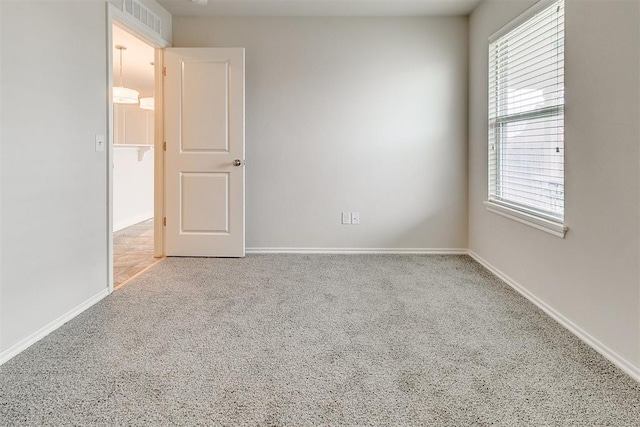 15108 Coldsun Dr, Oklahoma City, OK 73170 - carpeted empty room with baseboards