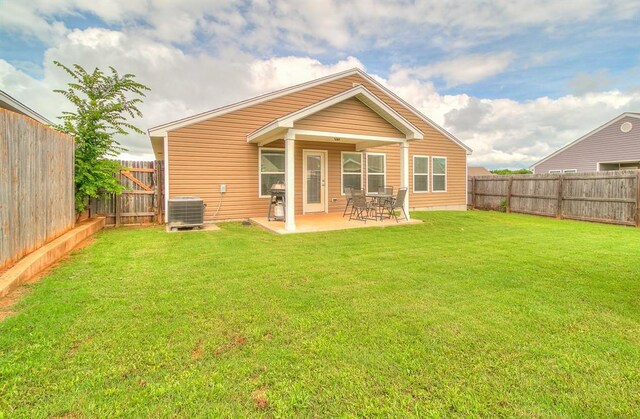 15108 Coldsun Dr, Oklahoma City, OK 73170 - rear view of house featuring a fenced backyard and a patio