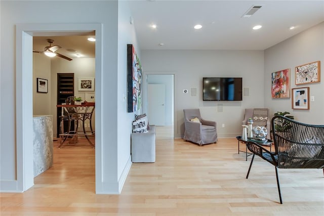 301 NE 4th St Unit 10, Oklahoma City, OK 73104 - hall featuring light wood-style flooring, baseboards, and recessed lighting