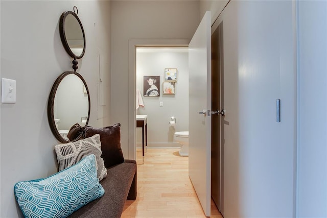 301 NE 4th St Unit 10, Oklahoma City, OK 73104 - hallway with light wood finished floors
