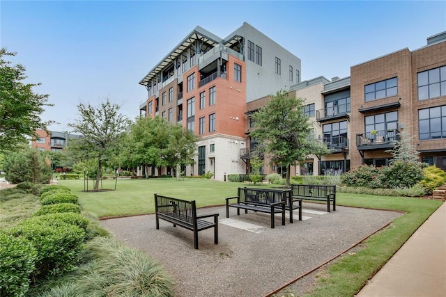 301 NE 4th St Unit 10, Oklahoma City, OK 73104 - view of community featuring a yard