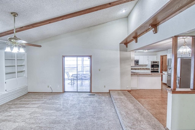 2804 Meadow Ave, Norman, OK 73072 - unfurnished living room with a ceiling fan, a textured ceiling, and baseboards