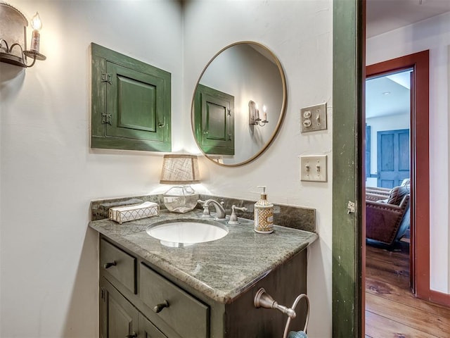 4005 NE 122nd St, Edmond, OK 73013 - bathroom with vanity and wood finished floors