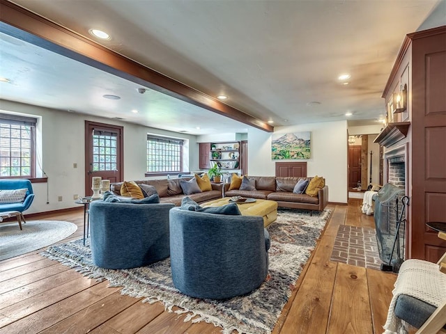 4005 NE 122nd St, Edmond, OK 73013 - living area with a fireplace, light wood finished floors, and recessed lighting