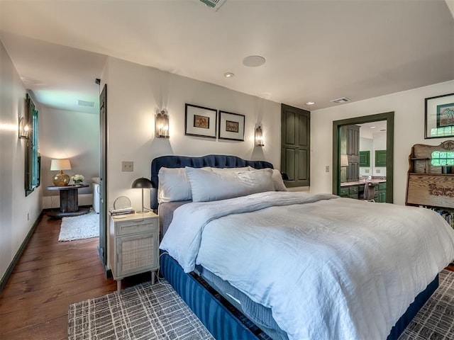 4005 NE 122nd St, Edmond, OK 73013 - bedroom featuring dark wood-style floors, ensuite bathroom, and recessed lighting
