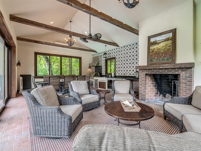 4005 NE 122nd St, Edmond, OK 73013 - living room featuring a chandelier and a fireplace