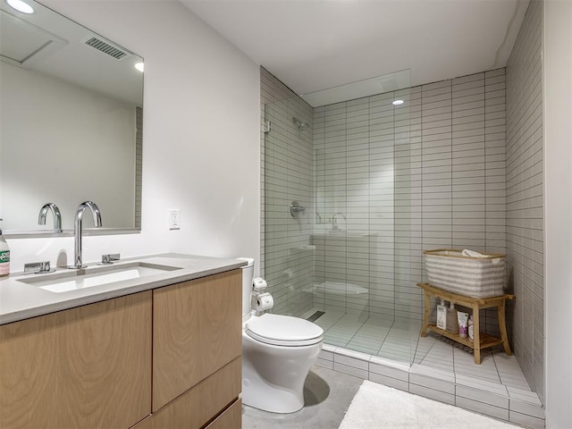 4005 NE 122nd St, Edmond, OK 73013 - bathroom with tiled shower, vanity, and tile patterned floors