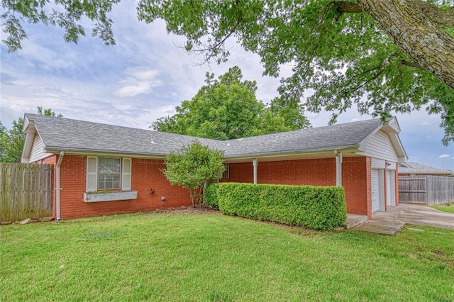 342 W Birch Dr, Mustang, OK 73064 - ranch-style home featuring brick siding, concrete driveway, a garage, and a shingled roof