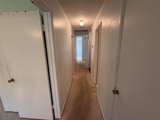 342 W Birch Dr, Mustang, OK 73064 - corridor with a textured ceiling and carpet floors