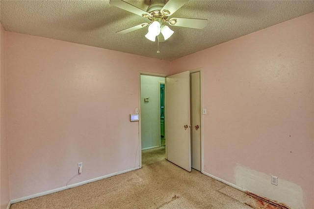 342 W Birch Dr, Mustang, OK 73064 - unfurnished room with light colored carpet, a textured ceiling, and a ceiling fan