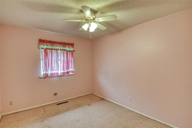 342 W Birch Dr, Mustang, OK 73064 - carpeted spare room with ceiling fan and a textured ceiling