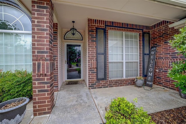 913 Elm Creek Dr, Moore, OK 73160 - view of exterior entry with brick siding