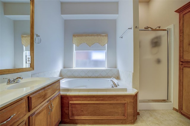 913 Elm Creek Dr, Moore, OK 73160 - full bathroom featuring a shower stall, a bath, vanity, and tile patterned floors