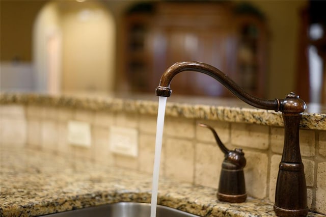 262 Shrouder Rd, Broken Bow, OK 74728 - detailed view of light stone counters and a sink