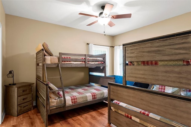 262 Shrouder Rd, Broken Bow, OK 74728 - bedroom featuring wood finished floors and a ceiling fan