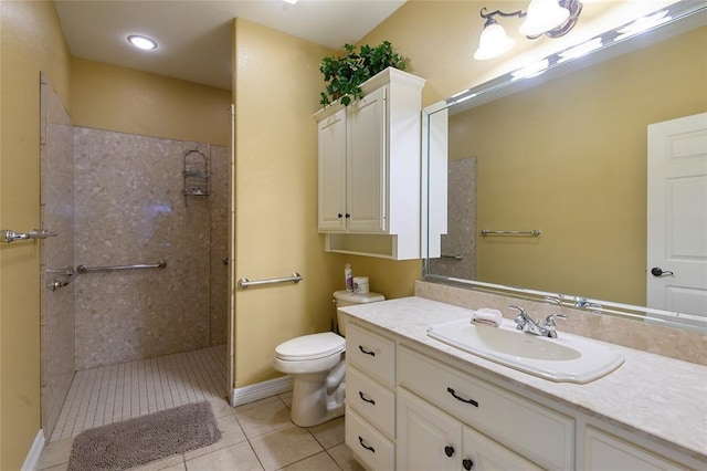 262 Shrouder Rd, Broken Bow, OK 74728 - bathroom featuring tile patterned flooring, a tile shower, vanity, toilet, and baseboards