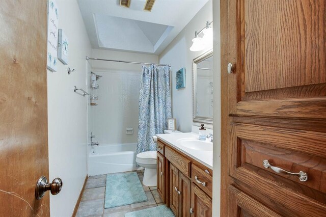 1408 Carlton, Edmond, OK 73034 - bathroom featuring vanity, toilet, shower / bath combo with shower curtain, and tile patterned floors