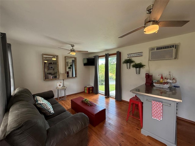 410052 E 1103rd Rd, Checotah, OK 74426 - living area with a ceiling fan, hardwood / wood-style floors, and a wall unit AC