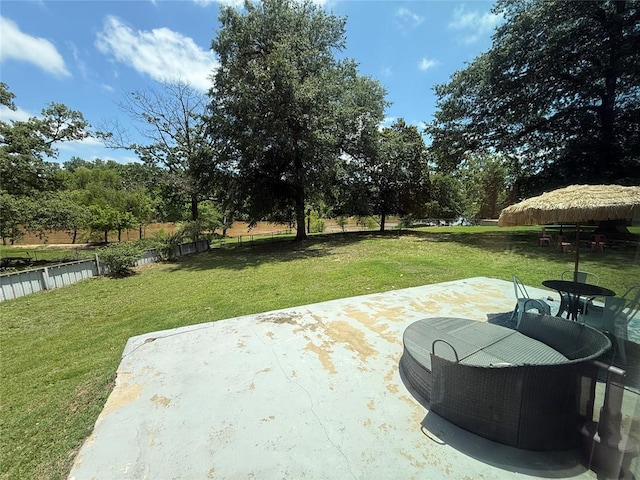 410052 E 1103rd Rd, Checotah, OK 74426 - view of green lawn featuring a patio