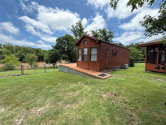 410052 E 1103rd Rd, Checotah, OK 74426 - view of side of property with log veneer siding and a deck