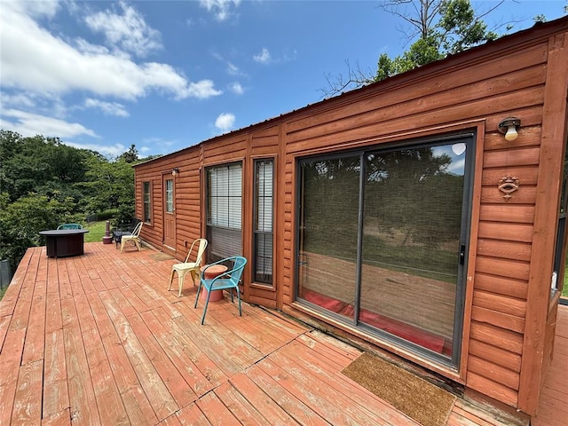410052 E 1103rd Rd, Checotah, OK 74426 - wooden terrace with a fire pit