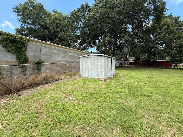 410052 E 1103rd Rd, Checotah, OK 74426 - view of yard featuring a storage unit