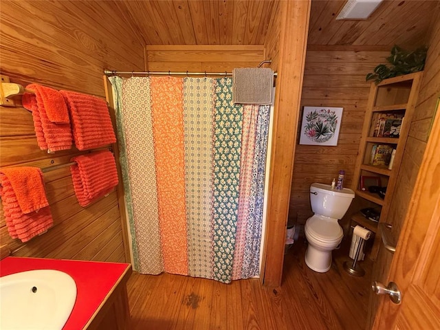 410052 E 1103rd Rd, Checotah, OK 74426 - bathroom featuring wooden walls, wooden ceiling, wood finished floors, vanity, and curtained shower