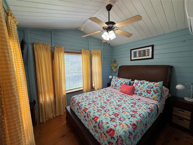 410052 E 1103rd Rd, Checotah, OK 74426 - bedroom featuring wood finished floors, vaulted ceiling, wood walls, wooden ceiling, and a ceiling fan