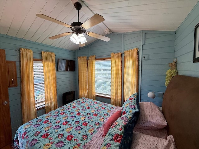 410052 E 1103rd Rd, Checotah, OK 74426 - bedroom featuring wooden walls, lofted ceiling, a ceiling fan, and wooden ceiling