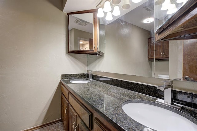 11129 E Thayer St, Midwest City, OK 73130 - bathroom featuring double vanity