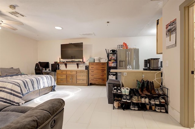 11129 E Thayer St, Midwest City, OK 73130 - bedroom featuring stainless steel fridge with ice dispenser and recessed lighting